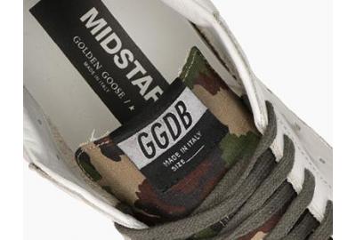 MID STAR by Golden Goose: English style sneakers symbol of streetwear elegance 